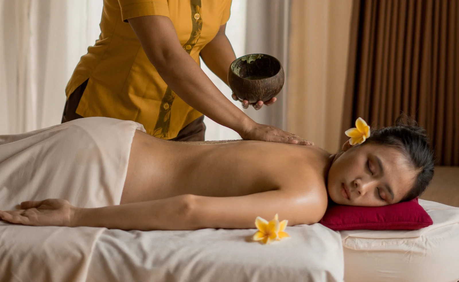 Therapist arranging aromatherapy oils at Imperial Spa And Wellness